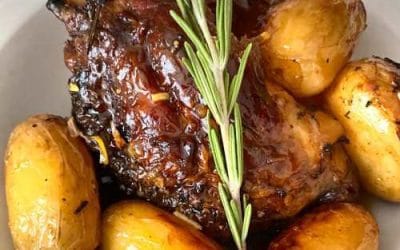 BRAISED LAMB KLEFTIKO WITH LEMON AND GARLIC POTATOES.